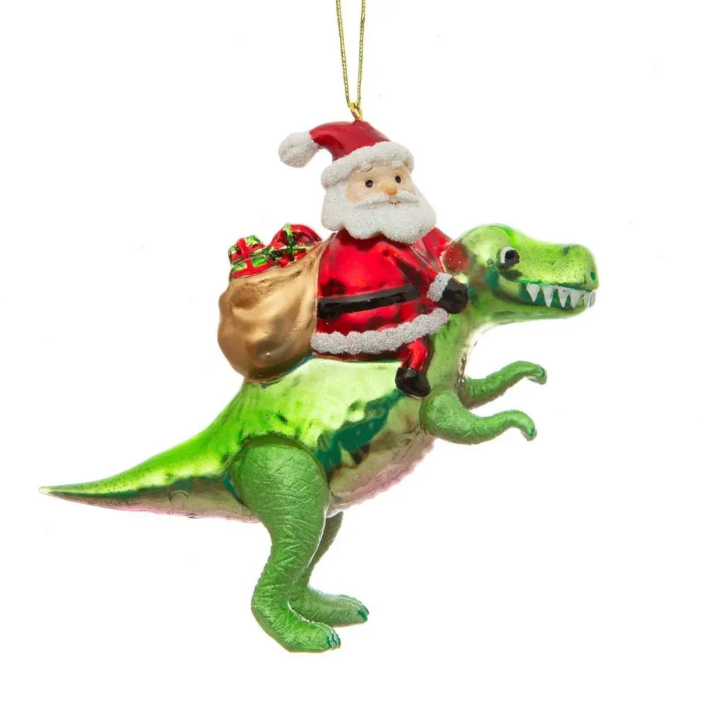 Joulupallo Joulupukki dinosauruksen selässä