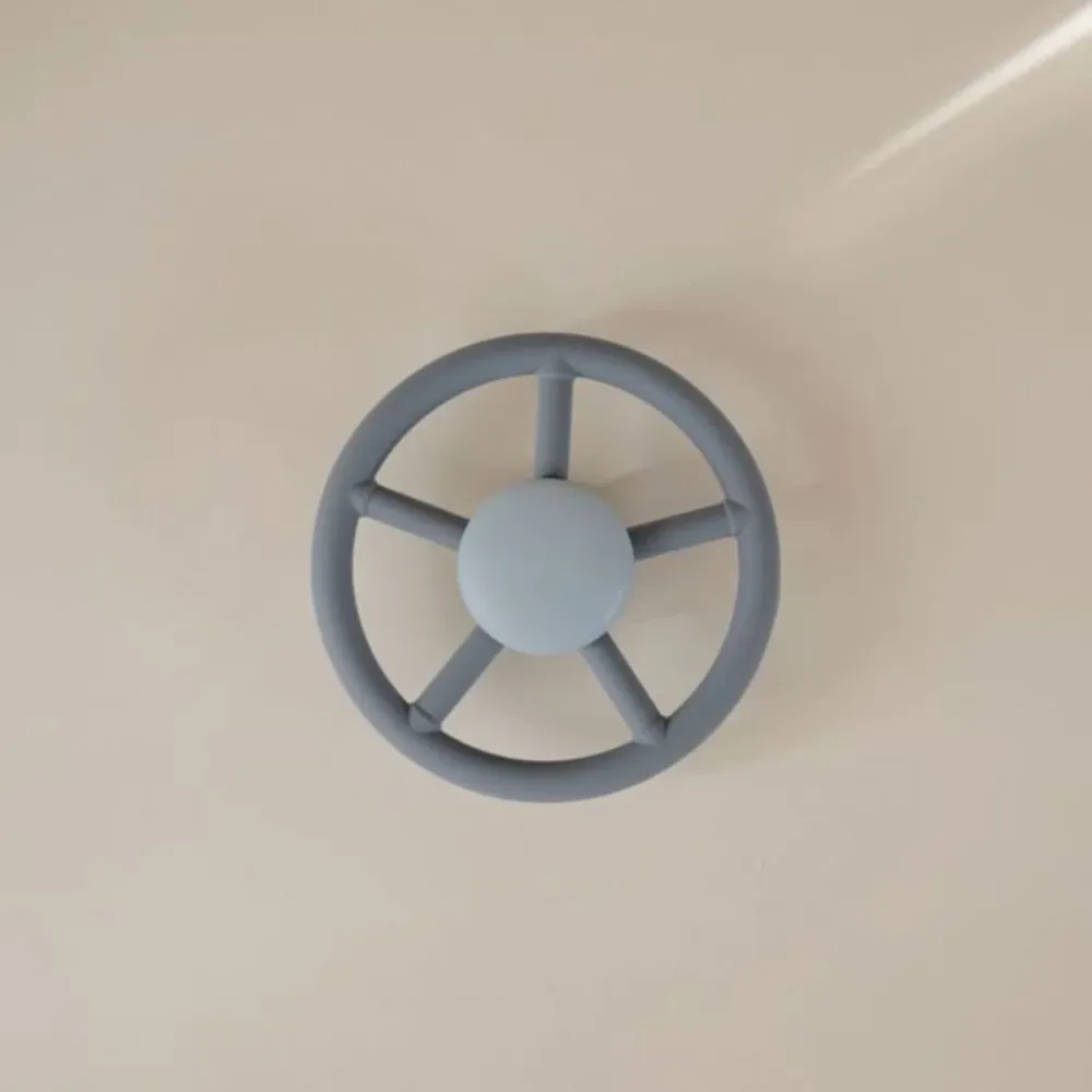 Mushie Spinner pyörä imukupin kanssa