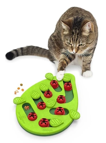 Nina Ottosson Puzzle & Play -peli, jossa on vihreää ja raapivaa leikkiä.