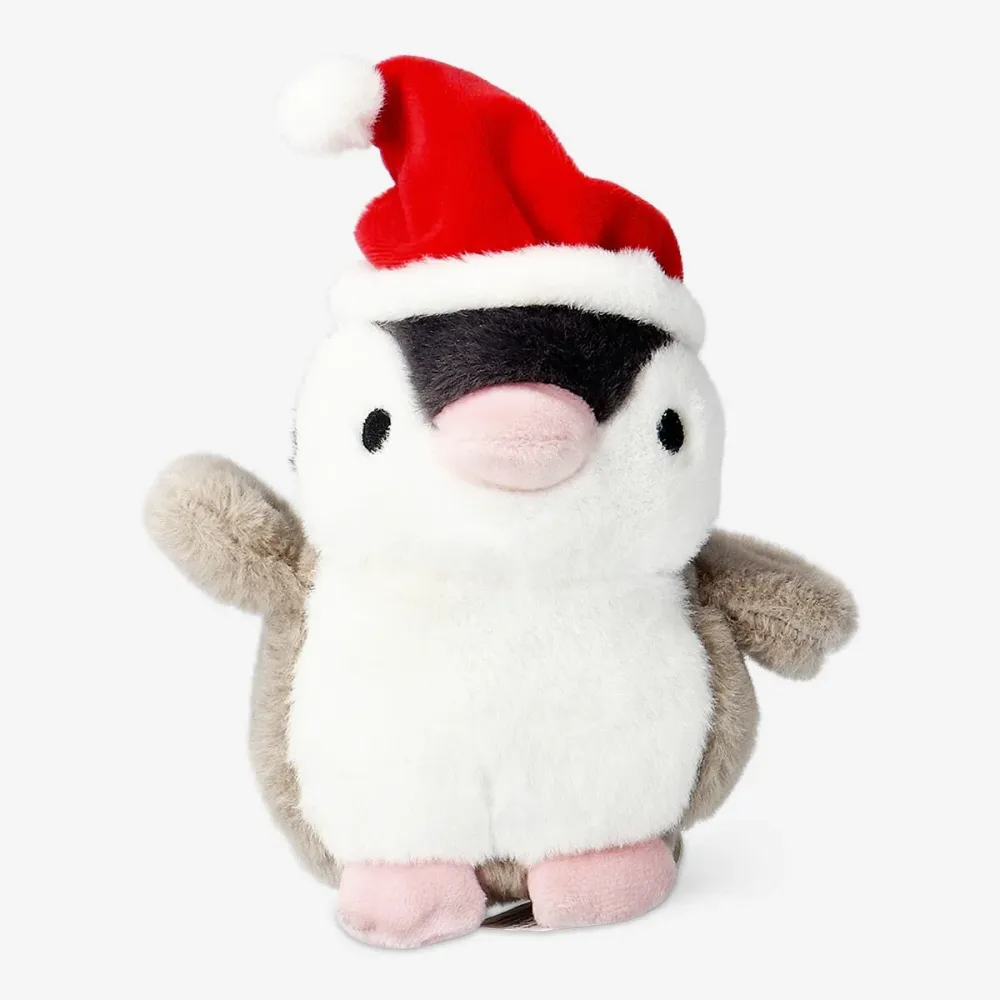 Pingviini pehmolelu, jossa on liikkuva häntä
